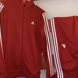 Matching adidas tracksuit.